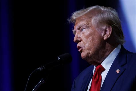 24 hours of Trump: QAnon tributes, crude attacks  .